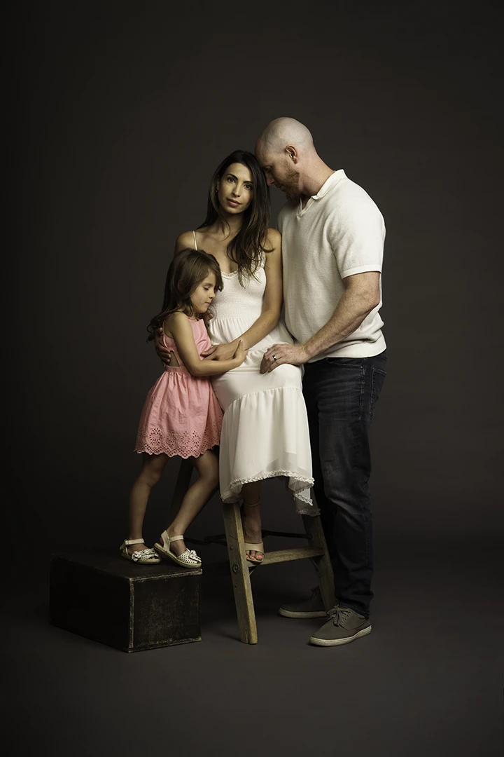 3 family members posing for portrait - photo portrait studio