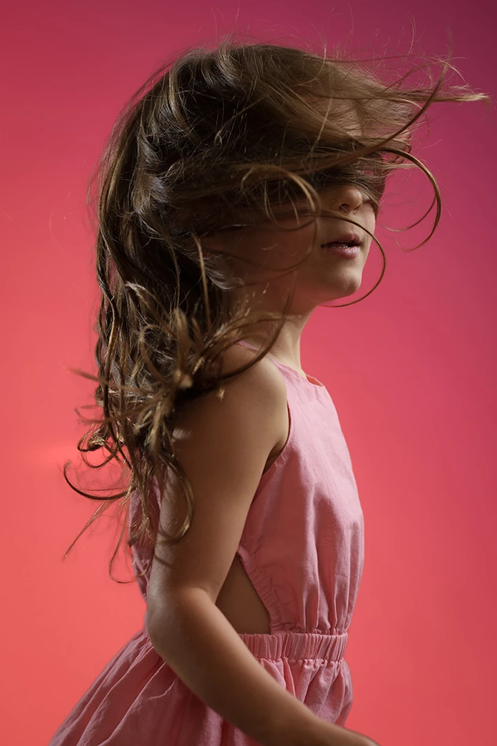 little girl portrait with hair covering face - Calgary family photos
