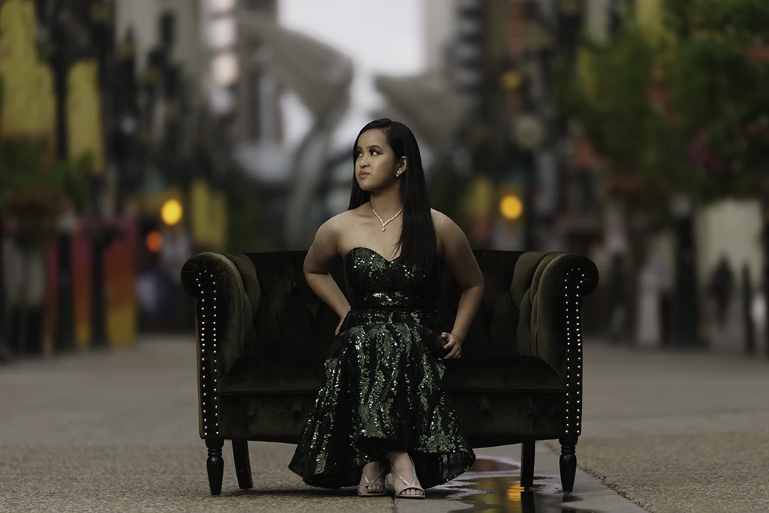 green sofa on street grad photo - Calgary grad photography